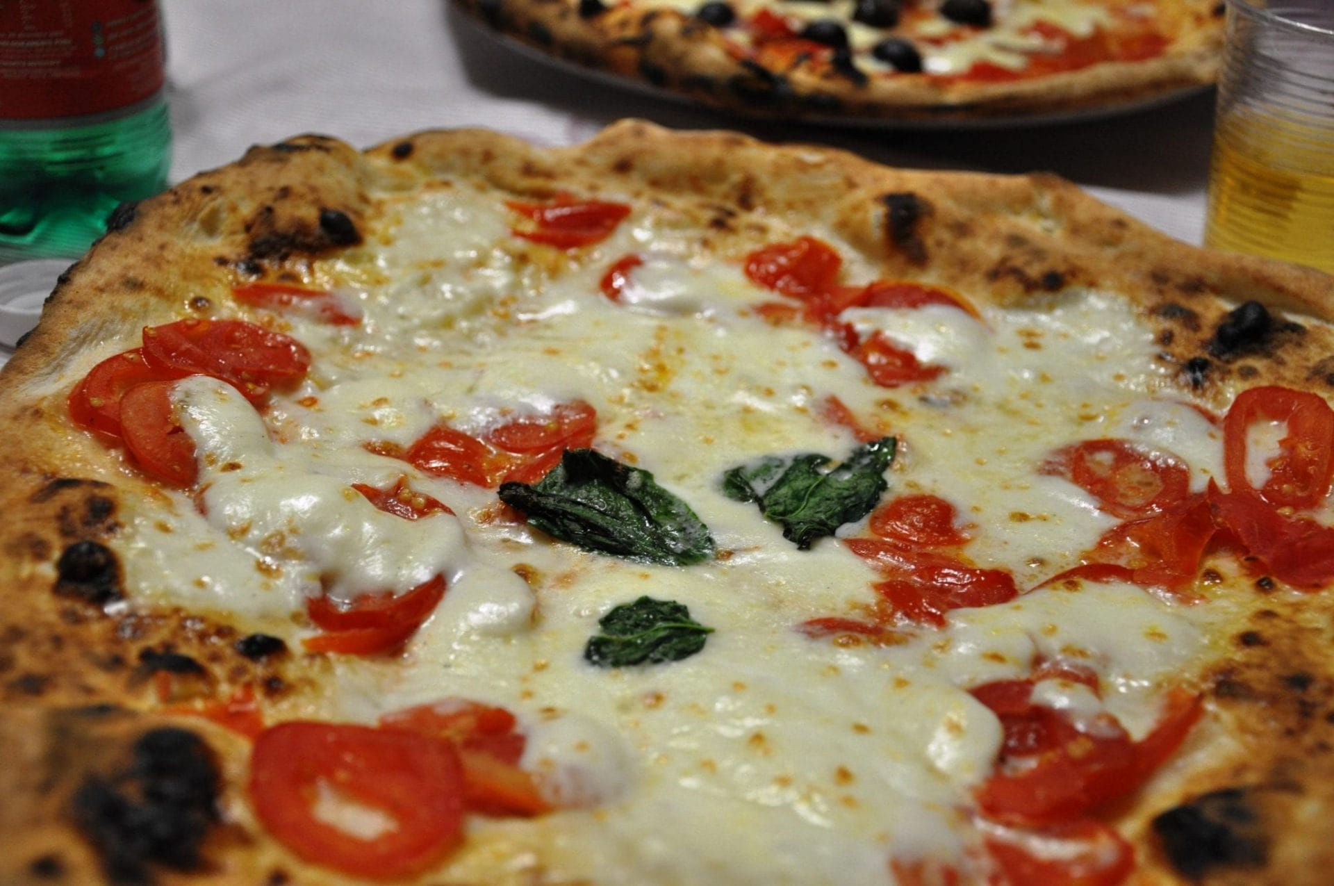A traditional pizza margherita of Naples, complete with the thick crust