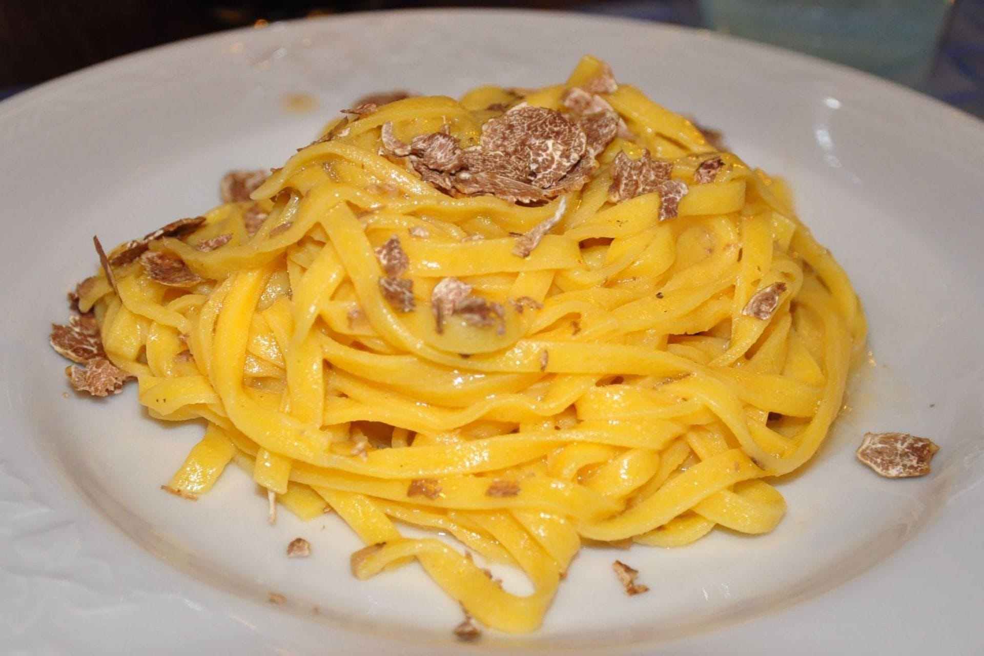 Tagliatelle with truffle at a festival in Italy Truffled pasta at an Italian sagra
