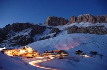 Illuminated small town in the Dolomites
