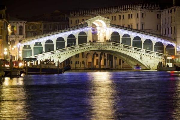 Venice is gorgeous year round, but heavy rains in the winter can be a pain for travelers. Illuminated Rialto Bridge