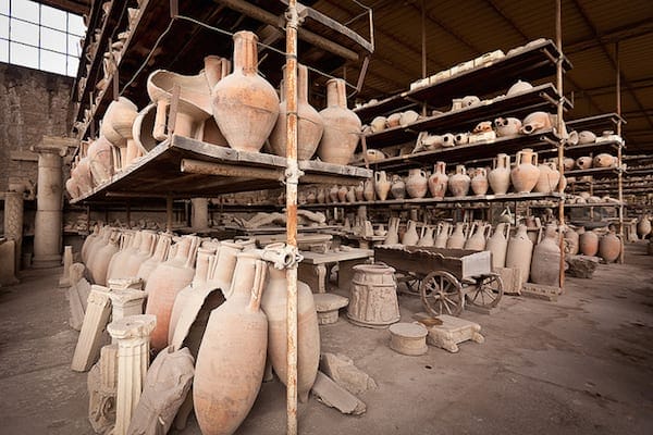 Vases used for weighing grain and other dried goods coming in to Pompeii for sale. Photo by jimmyweee 