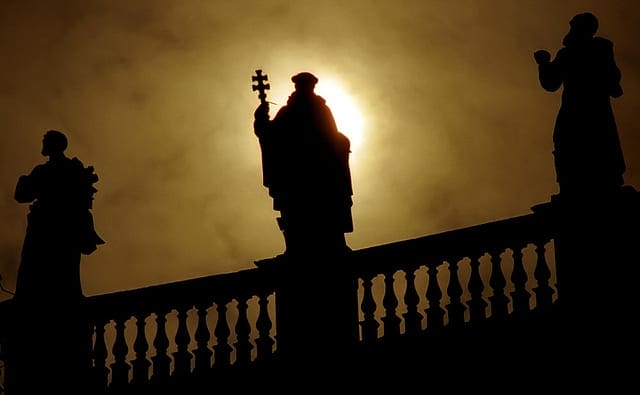 The silhouette of a saint The Piazza San Pietro, a testament to the history and power of Vatican City and its Basilica. Photo by David Ohmer 
