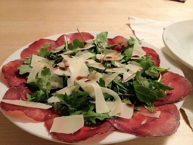 Bresaola is usually served simply. A bit of olive oil, grated cheese, and maybe arugula. Photo by Glen MacLarty