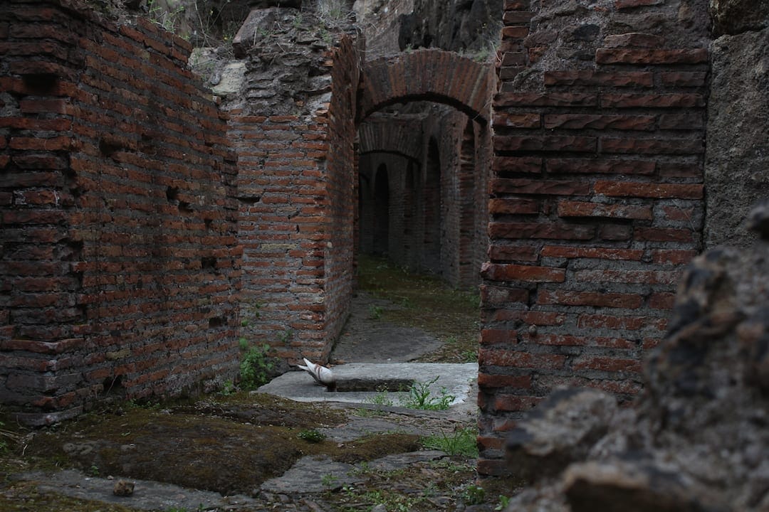 A view of the cells beneath the original floor of the Colosseum that were built to hold animals and gladiators, but not at the same time. Photo courtesy of Ryan Brown over at http://lostboymemoirs.com.