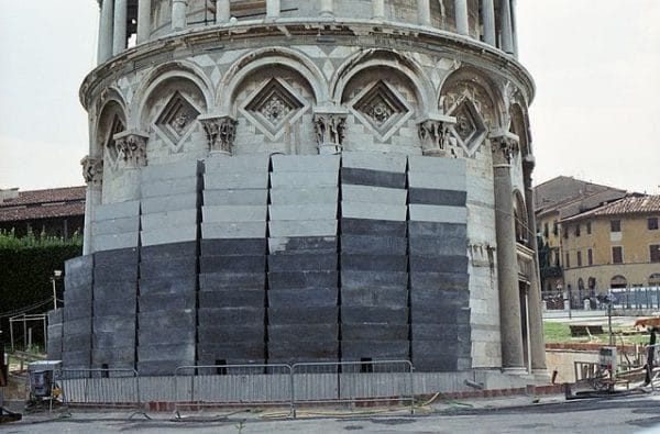 Lead counterweights are stacked on the tower during restoration in 1998. Photo by Rolf Gebhardt