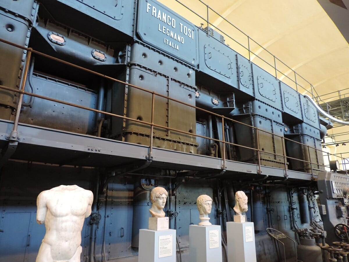 Steam powered engine behind statues at Rome's Centrale Montemartini museum