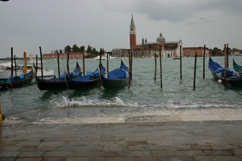 Venice gondolas at high tide