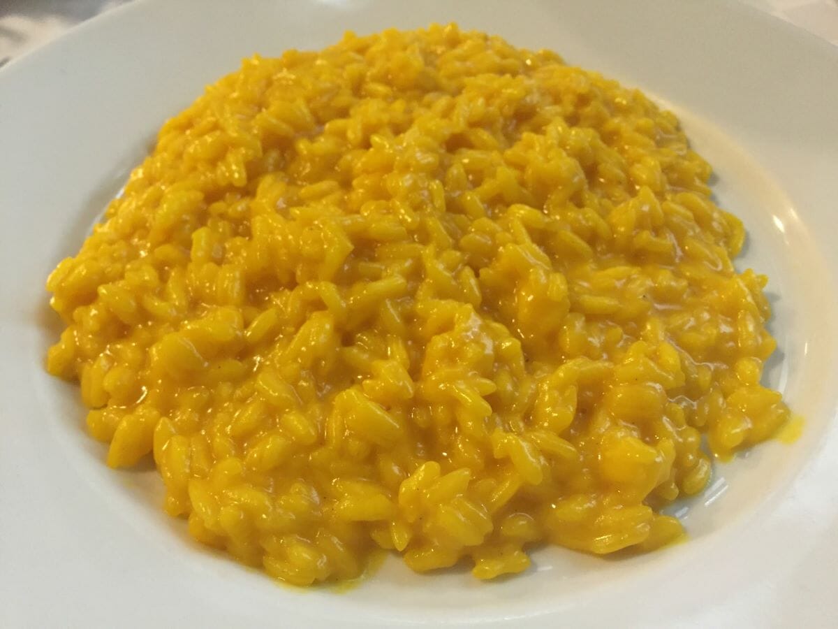 a bowl of yellow rice risotto
